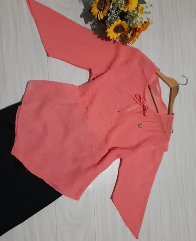 Blusa feminina NOVA em 100% poliéster. <br>