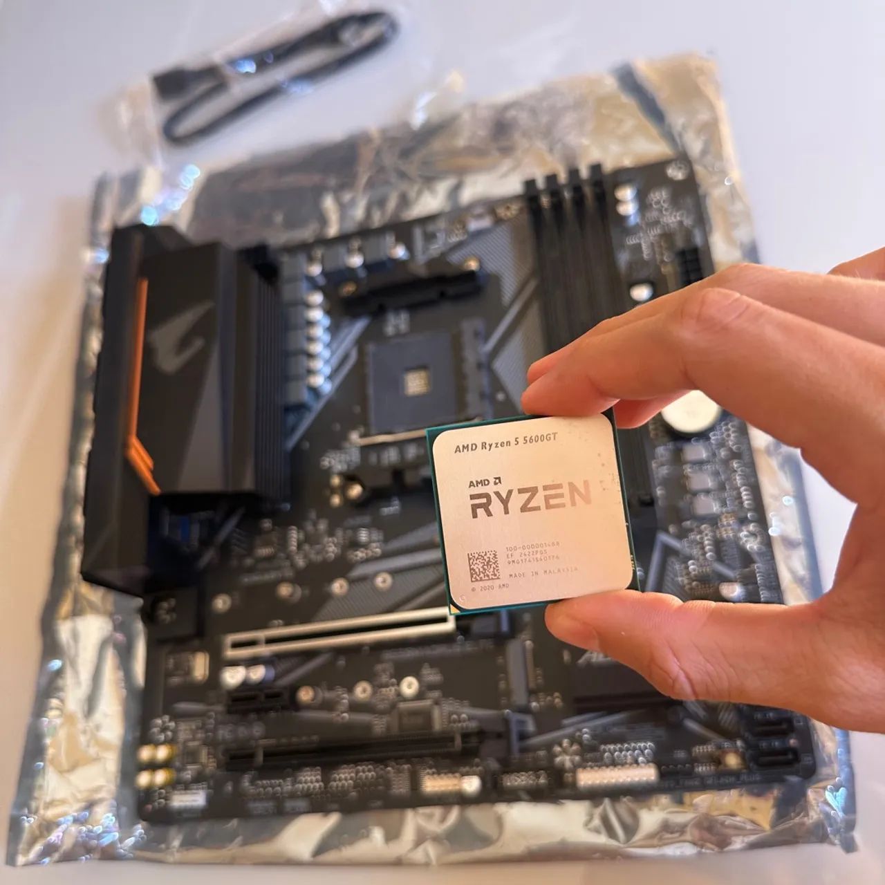 Kit Aorus Elite + Ryzen 5600Gt(Envio OlxPay) - Foto 4