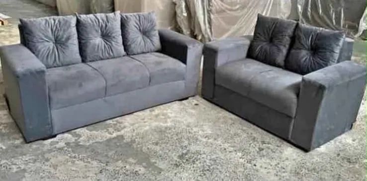 Conjunto sofá com almofadas