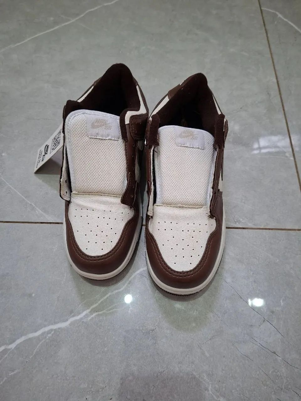 Nike dunk sb marrom e branco 
