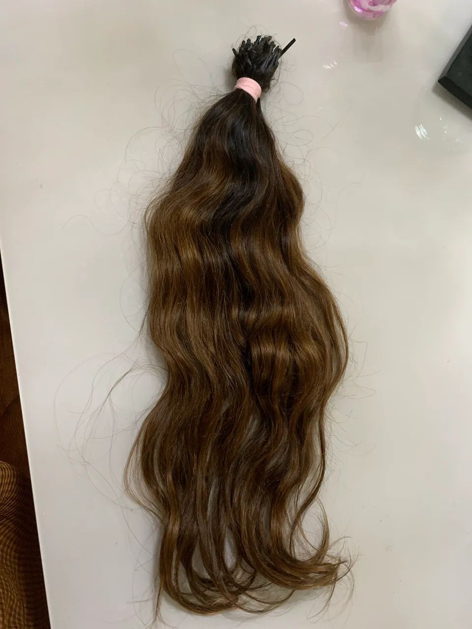 Cabelo humano , 120 gramas 65 centímetros. 