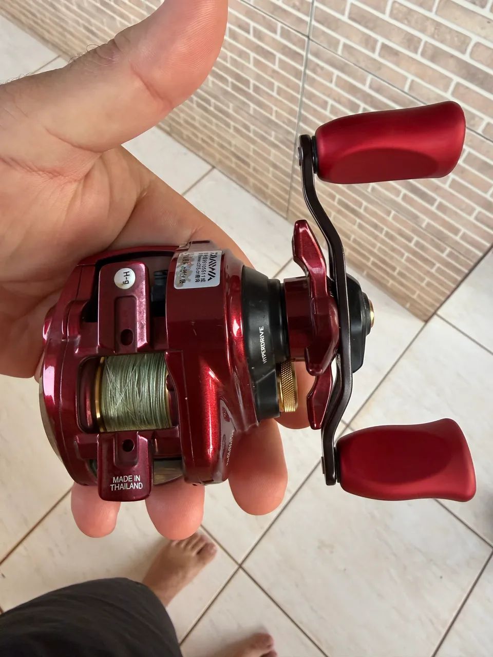 Carretilha Daiwa salamandura 70 - Foto 5