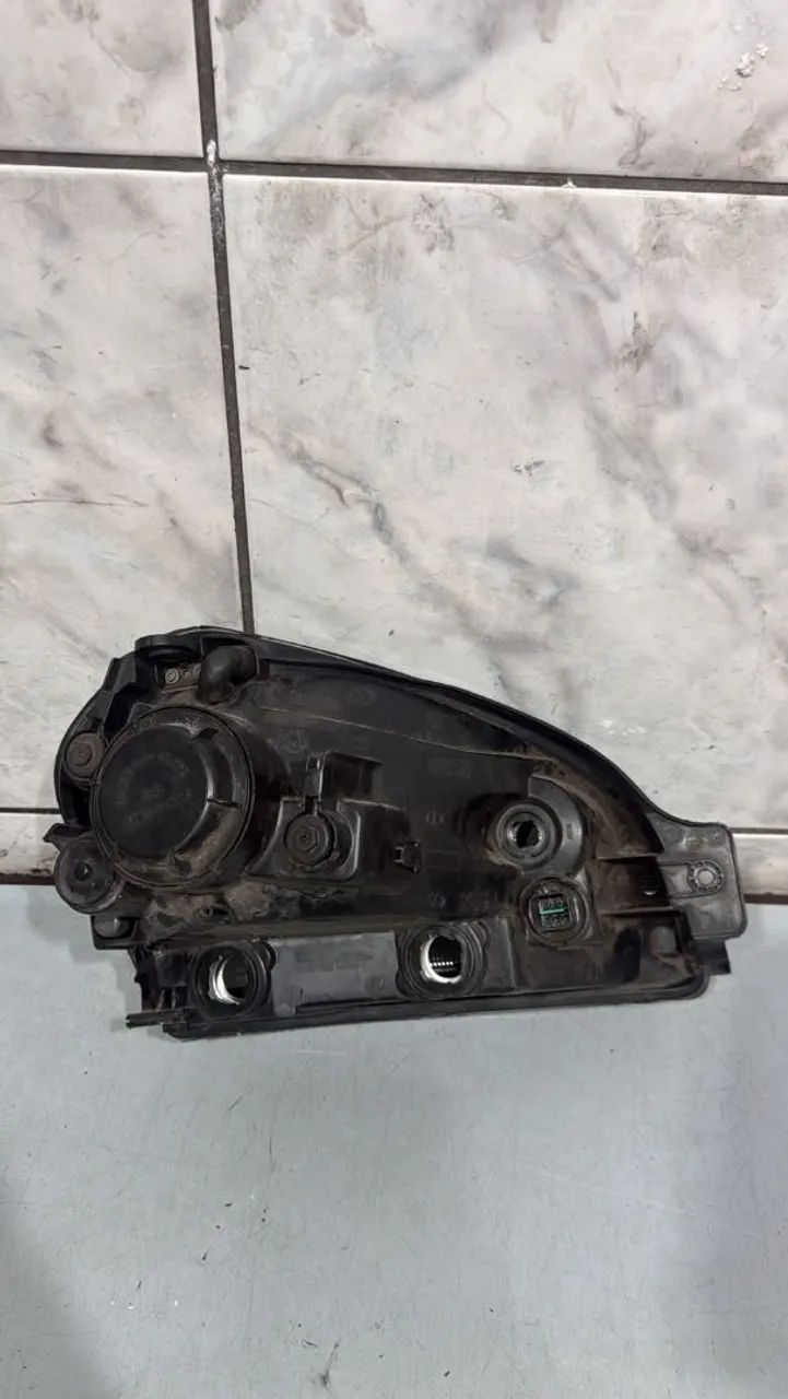 Farol esquerdo Tucson 2009 a 2015  - Foto 3