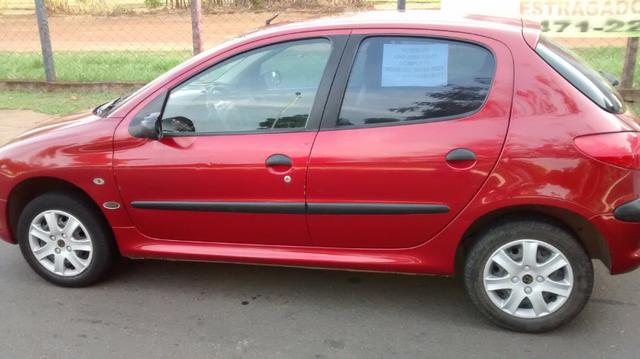 Peugeot 206 impecável,particular com procedência provada por nota fiscal, manual e doc - Foto 3