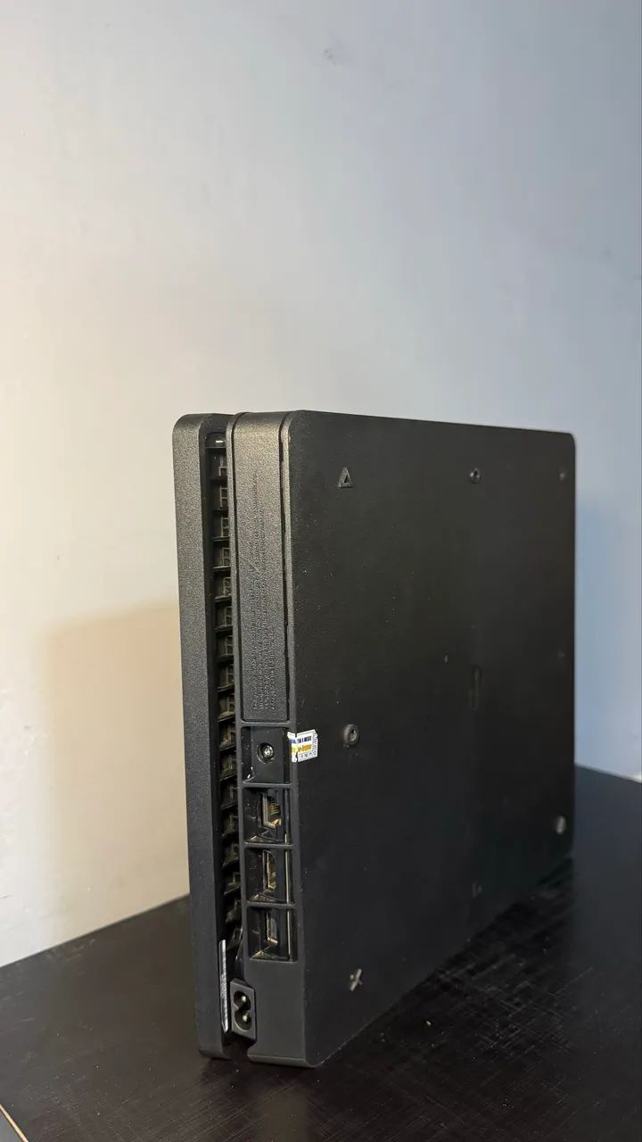 PS4 Slim - 1TB + 2 Jogos  - Foto 5