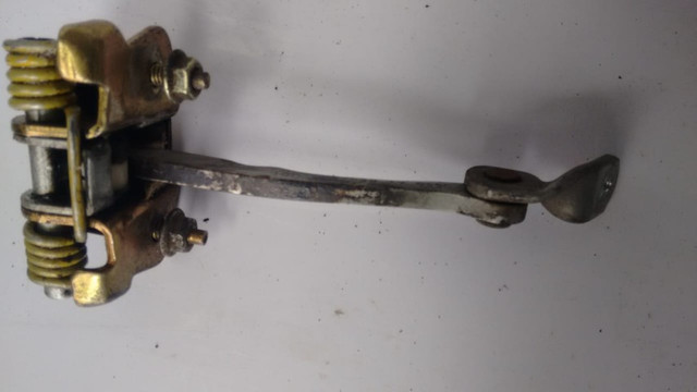 Limitador porta esquerda Clio