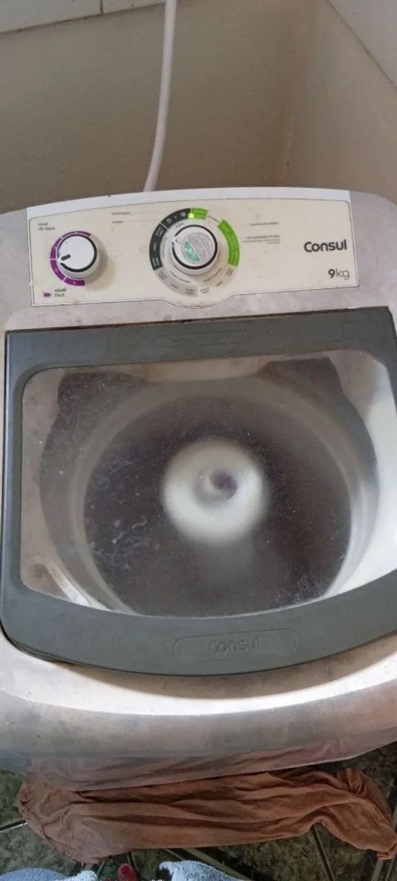 Máquina de lavar usada