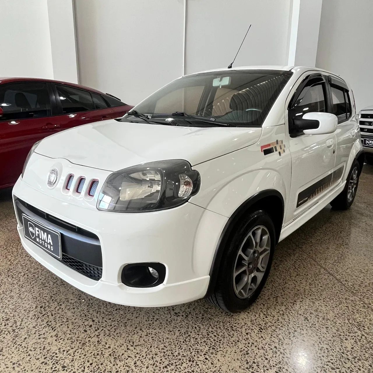 Fiat Uno Sporting 1.4 EVO Fire Flex 8V 4P 2013 - Foto 2