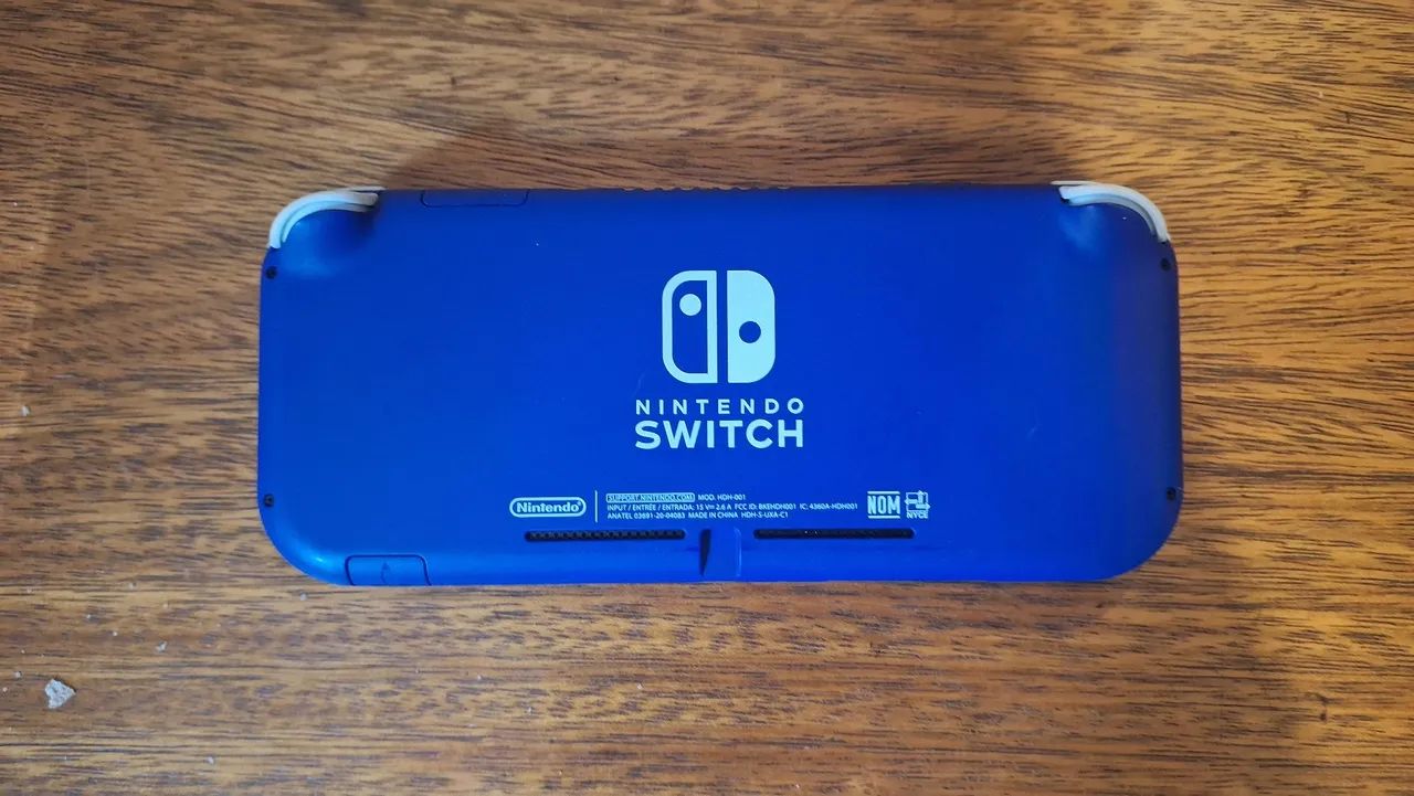 Nintendo Switch Lite Azul + Cartão SSD - Foto 3