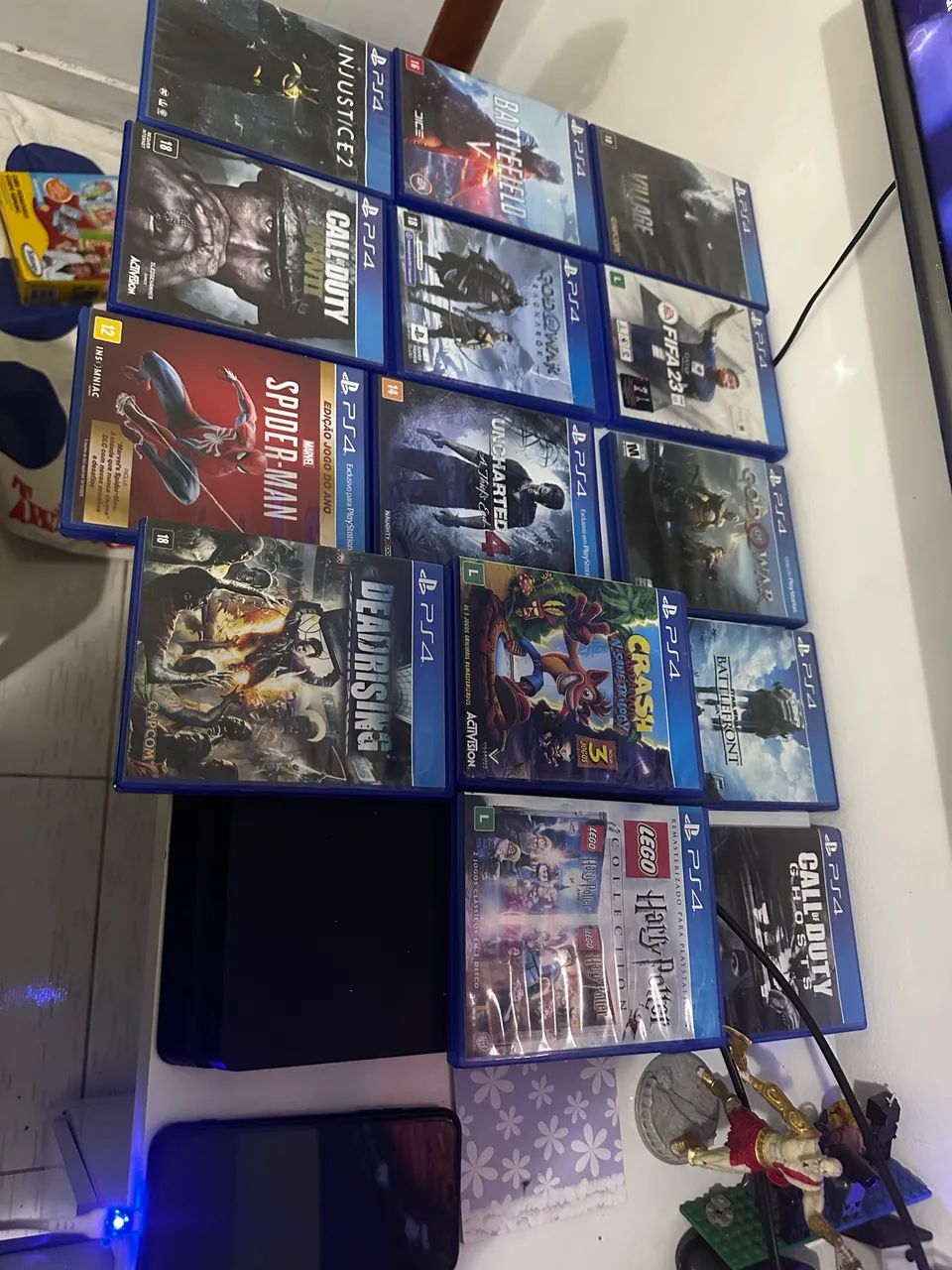PS4 SLIM 870GB COM 2 COM TROLES E JOGOS - Foto 2