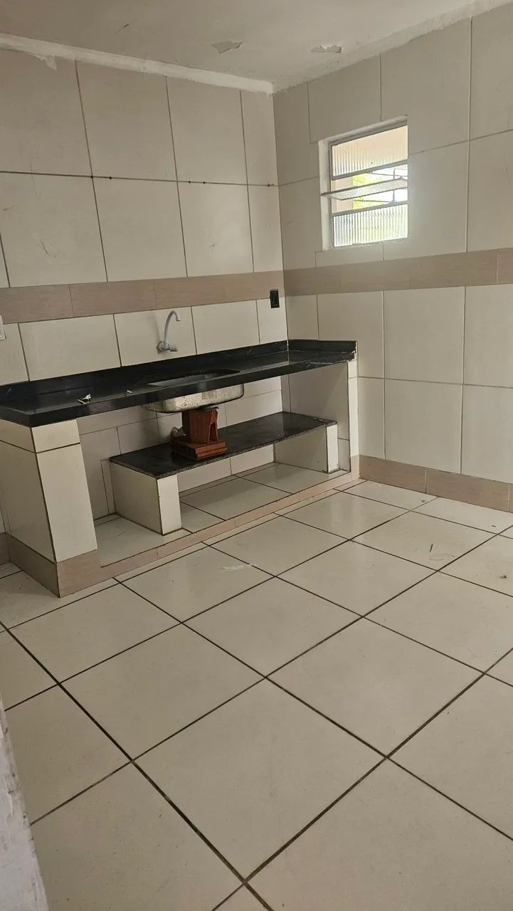Vendo casa primeiro andar e 2 kitnets - Foto 2