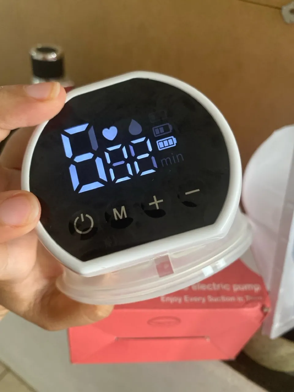Bomba de tirar leite eletrica portatil