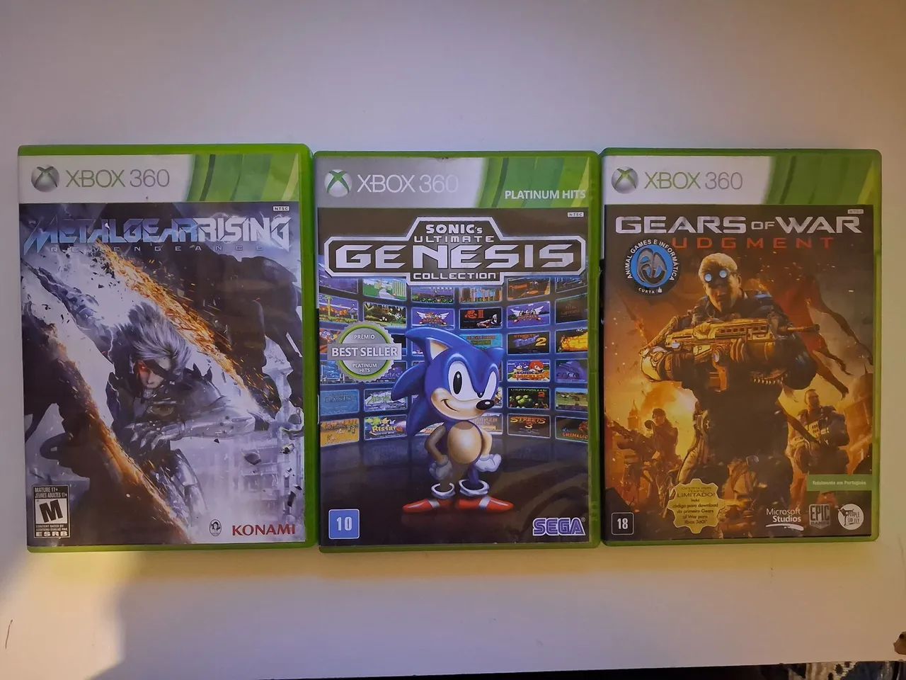 3 Jogos Xbox 360 - Metal Gear Rising, Sonic's Ultimate Genesis, Gears of War Judgment