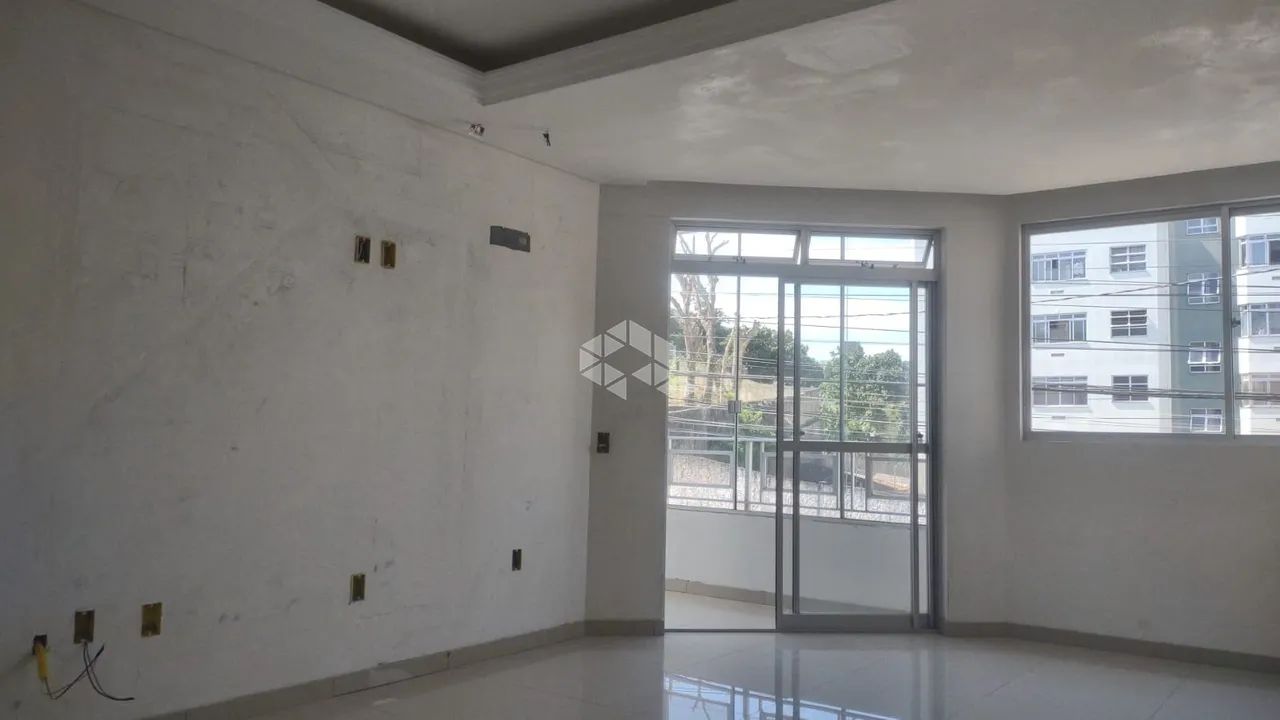 Apartamento com sacada 3 Dormitórios sendo 1 Suíte no bairro capoeiras
