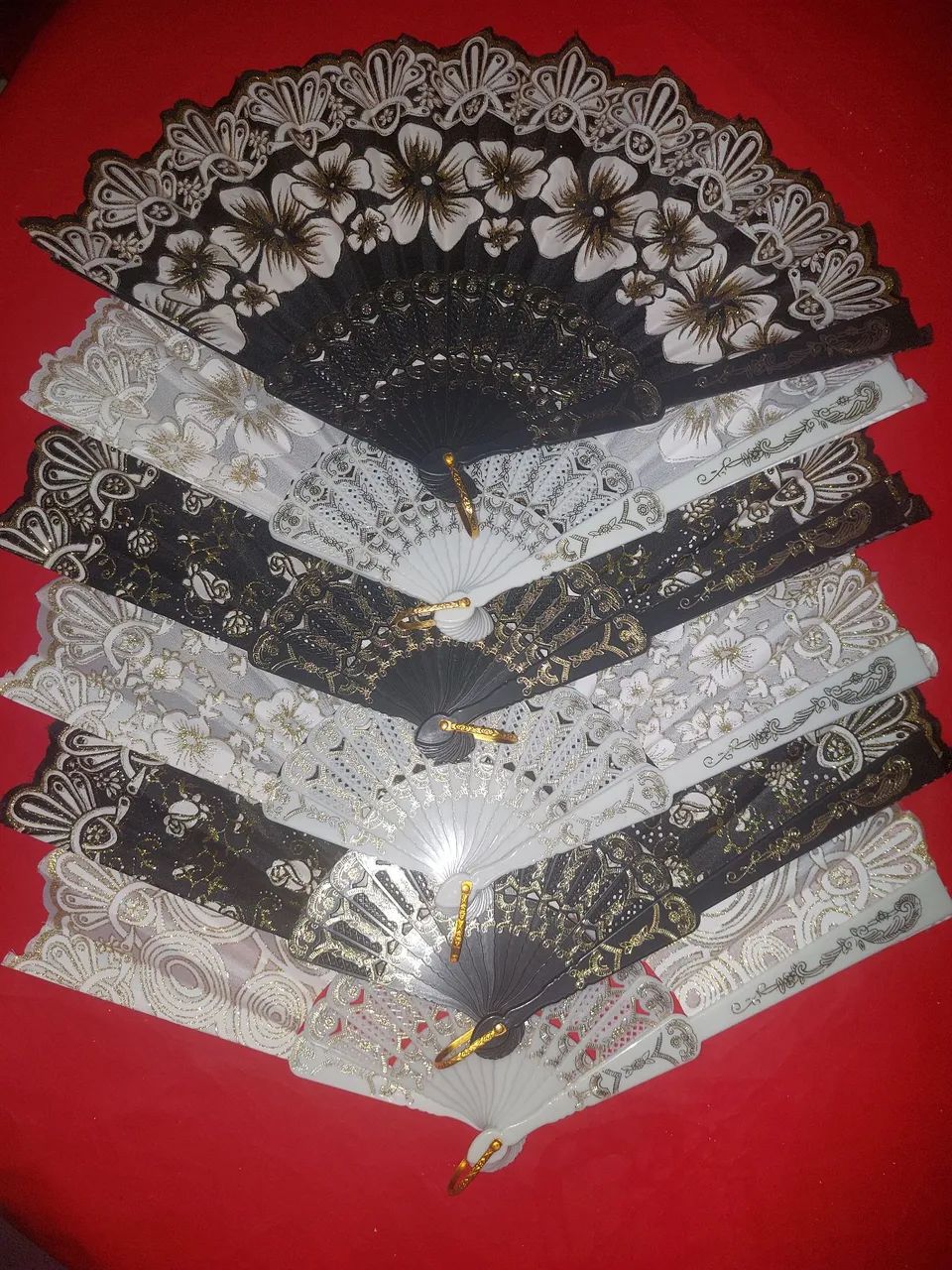 Leque plástico dobrável com estampas florais - Foto 2
