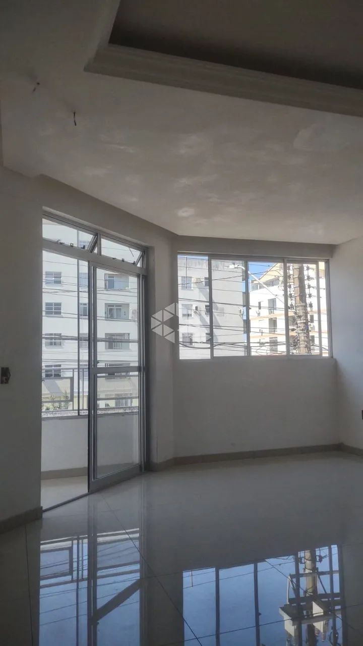 Apartamento com sacada 3 Dormitórios sendo 1 Suíte no bairro capoeiras - Foto 3