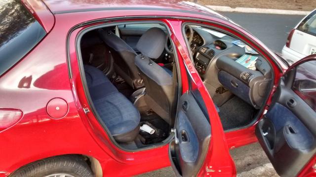 Peugeot 206 impecável,particular com procedência provada por nota fiscal, manual e doc - Foto 4
