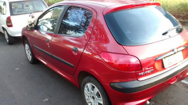 Peugeot 206 impecável,particular com procedência provada por nota fiscal, manual e doc - Foto 7