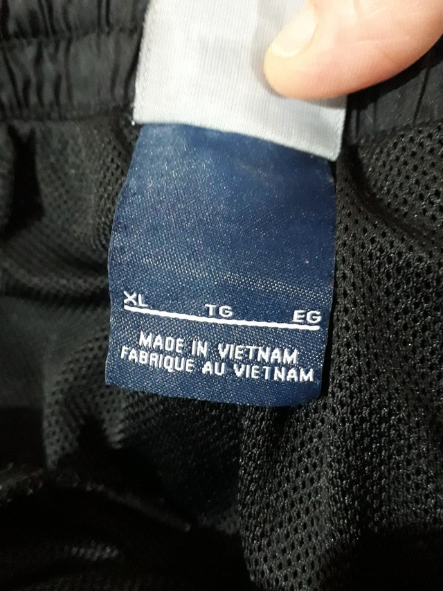 Calça Nike original de poliéster forrada tam 10 anos. Ver medidas na primeira foto  - Foto 3