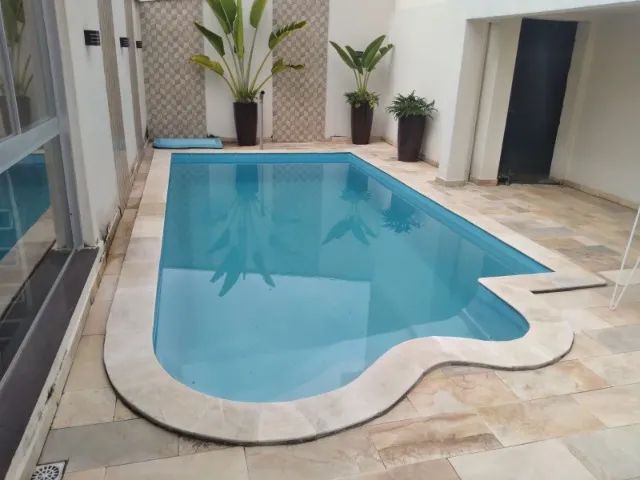 Vi- Piscina retangular de fibra com detalhe na escada de 6x3