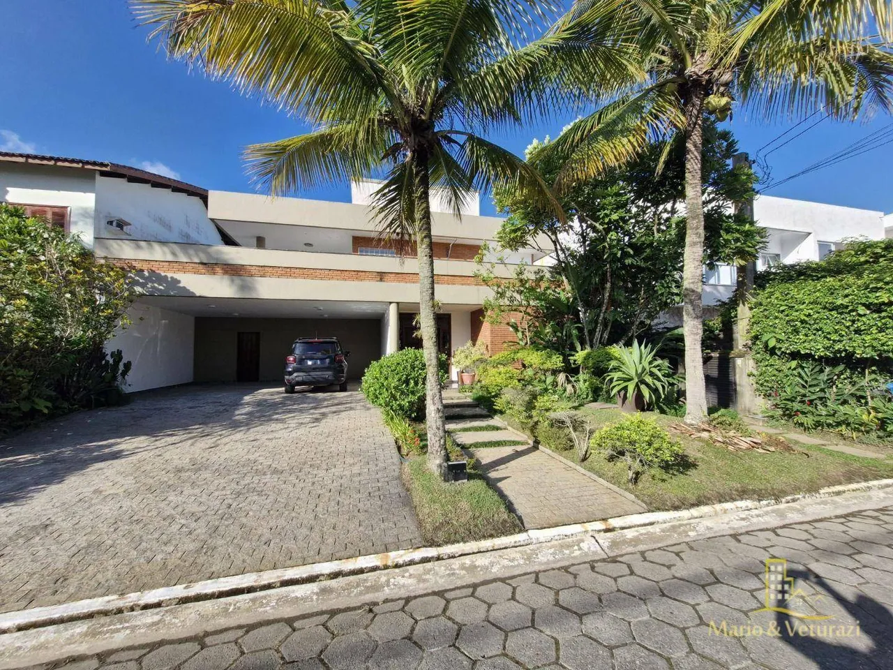 Sobrado com 4 suítes à venda, 370 m² por R$ 2.400.000,00 - Acapulco - Guarujá/SP