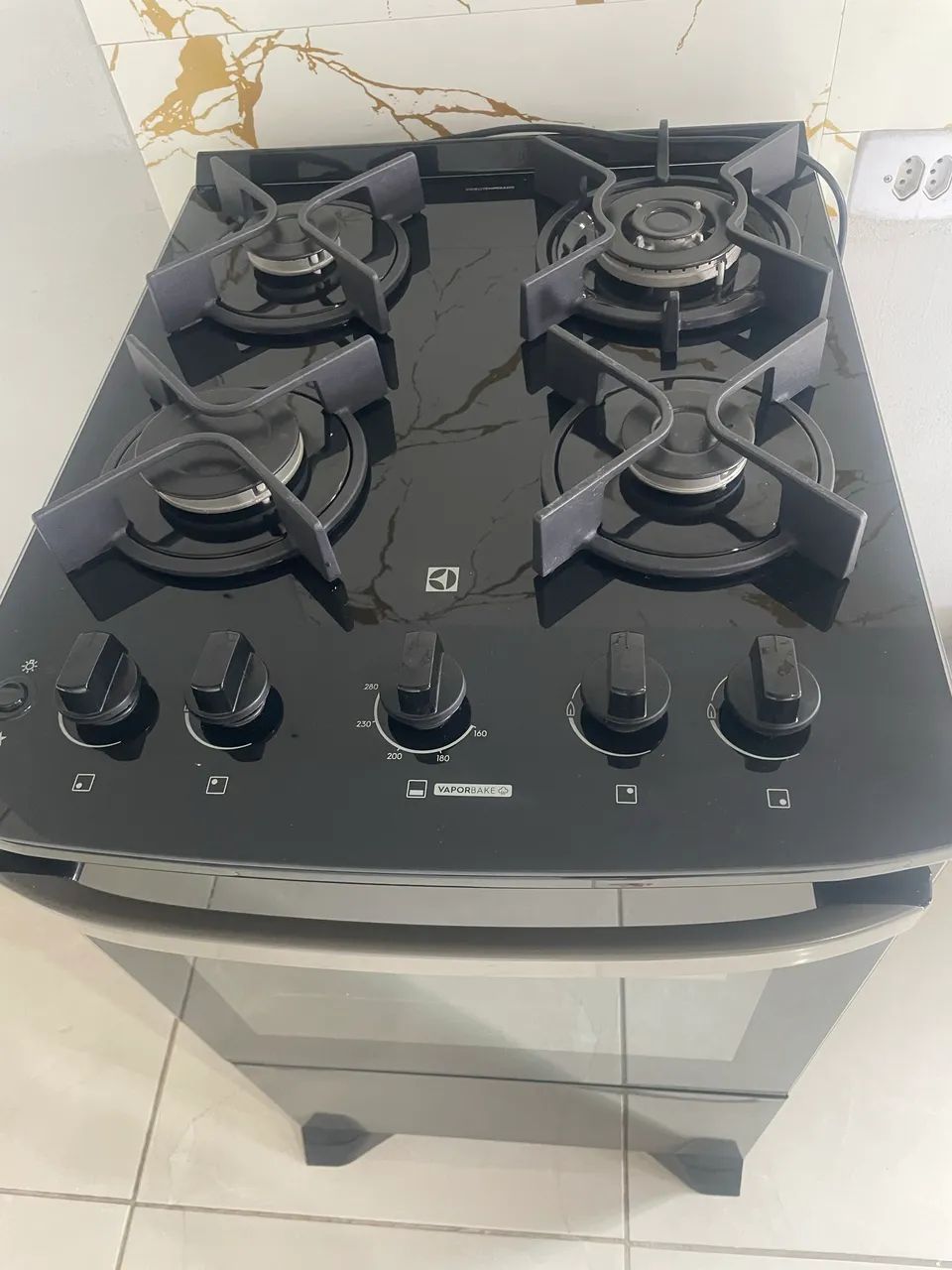 Fogão 4 bocas Eletrolux preto efficient mesa de vidro - Foto 5