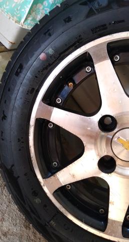 Vendo 4 rodas liga leve e 4 pneus Dunlop zerados - Foto 3