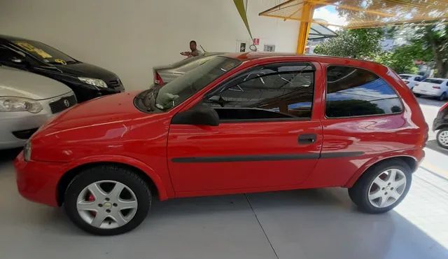 GM - Chevrolet Corsa Sedan Milenium 1.0 16v Vermelha 2001 - Campo