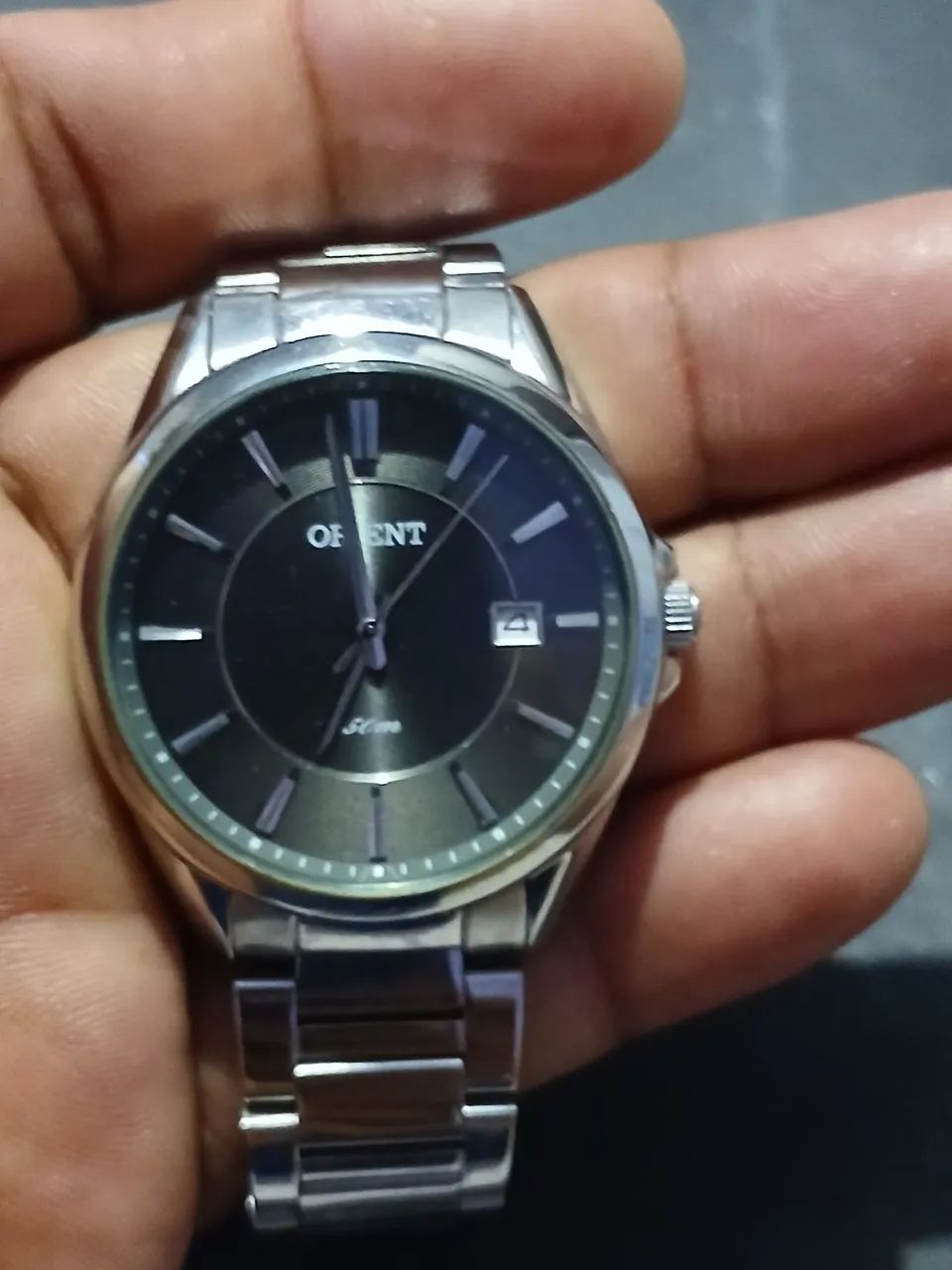 Relógio Orient valor 200 reais 