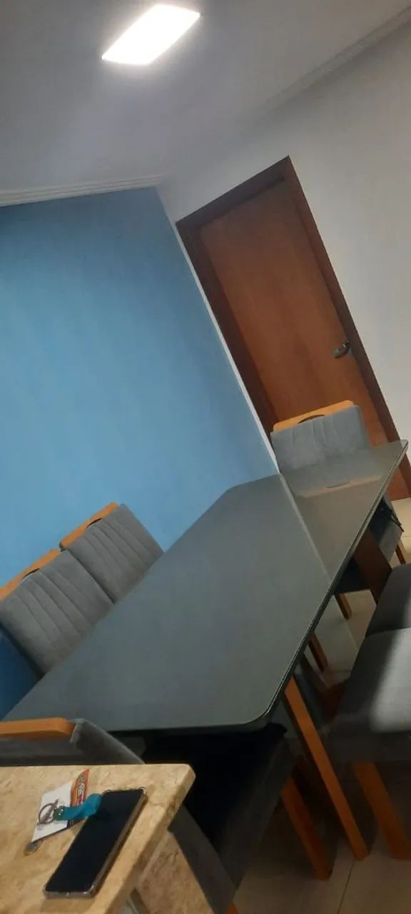 Mesa de jantar com tampo de vidro