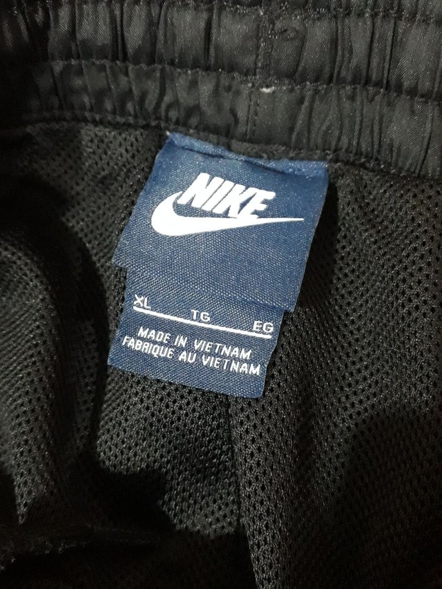 Calça Nike original de poliéster forrada tam 10 anos. Ver medidas na primeira foto  - Foto 2