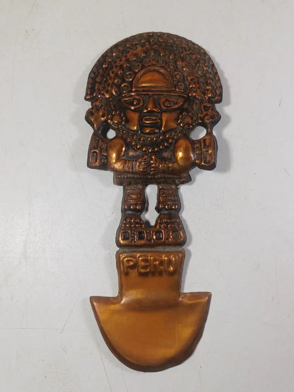 Adorno de parede em cobre Tumi peruano 