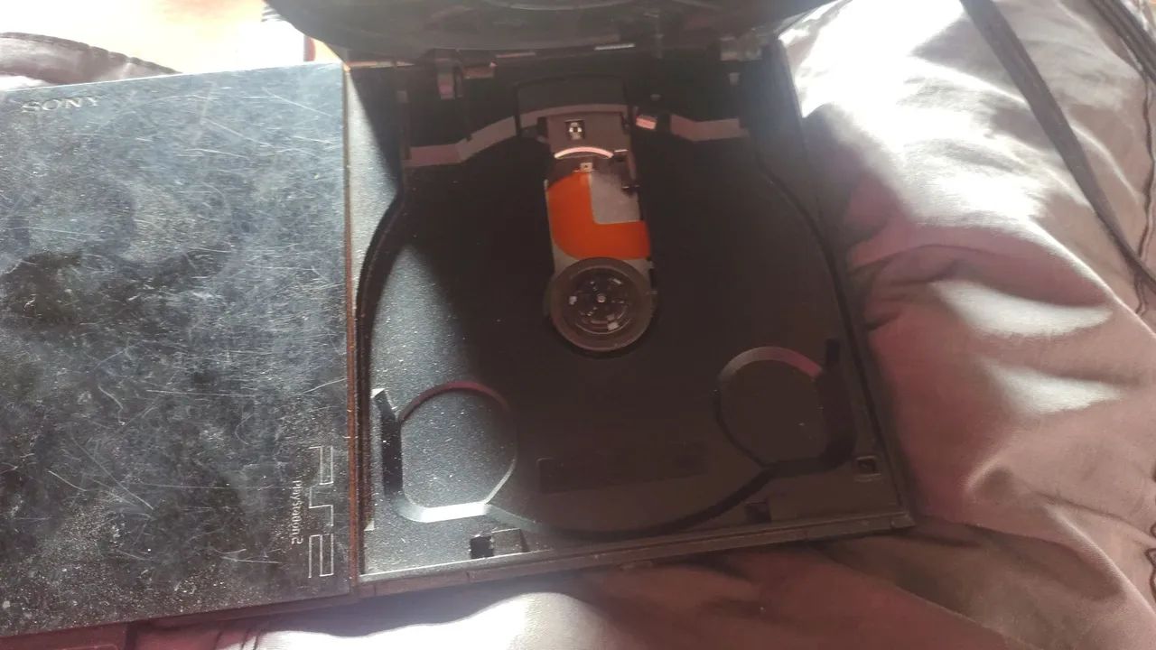PS2 (com defeito) pra retirada de peça e leitor original - Foto 2