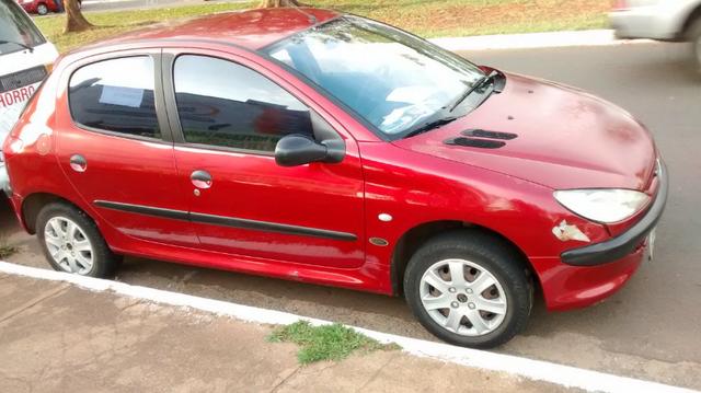 Peugeot 206 impecável,particular com procedência provada por nota fiscal, manual e doc - Foto 2
