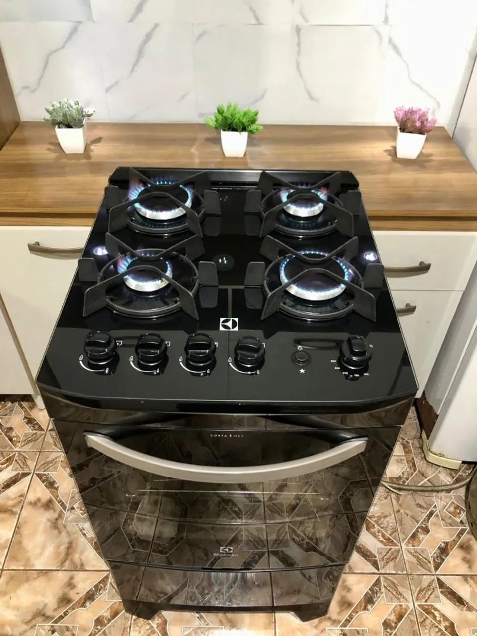 VENDO FOGÃO MODELO ELECTROLUX MESA DE VIDRO 04 BOCAS  - Foto 6