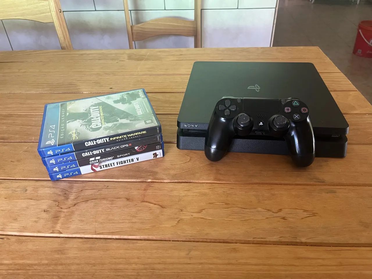 PS4 Slim 500gb + 4 jogos  - Foto 4