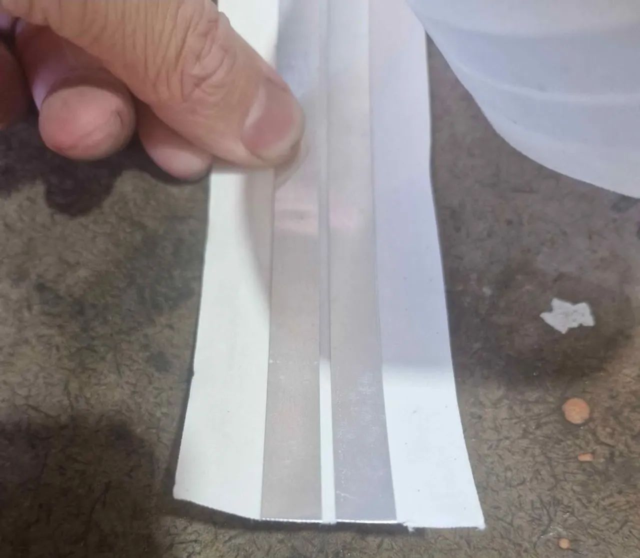 Fita de canto metálica 