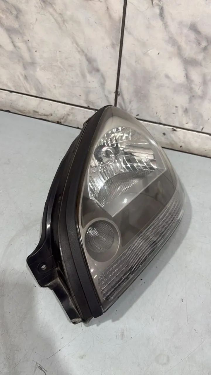 Farol esquerdo Tucson 2009 a 2015  - Foto 4