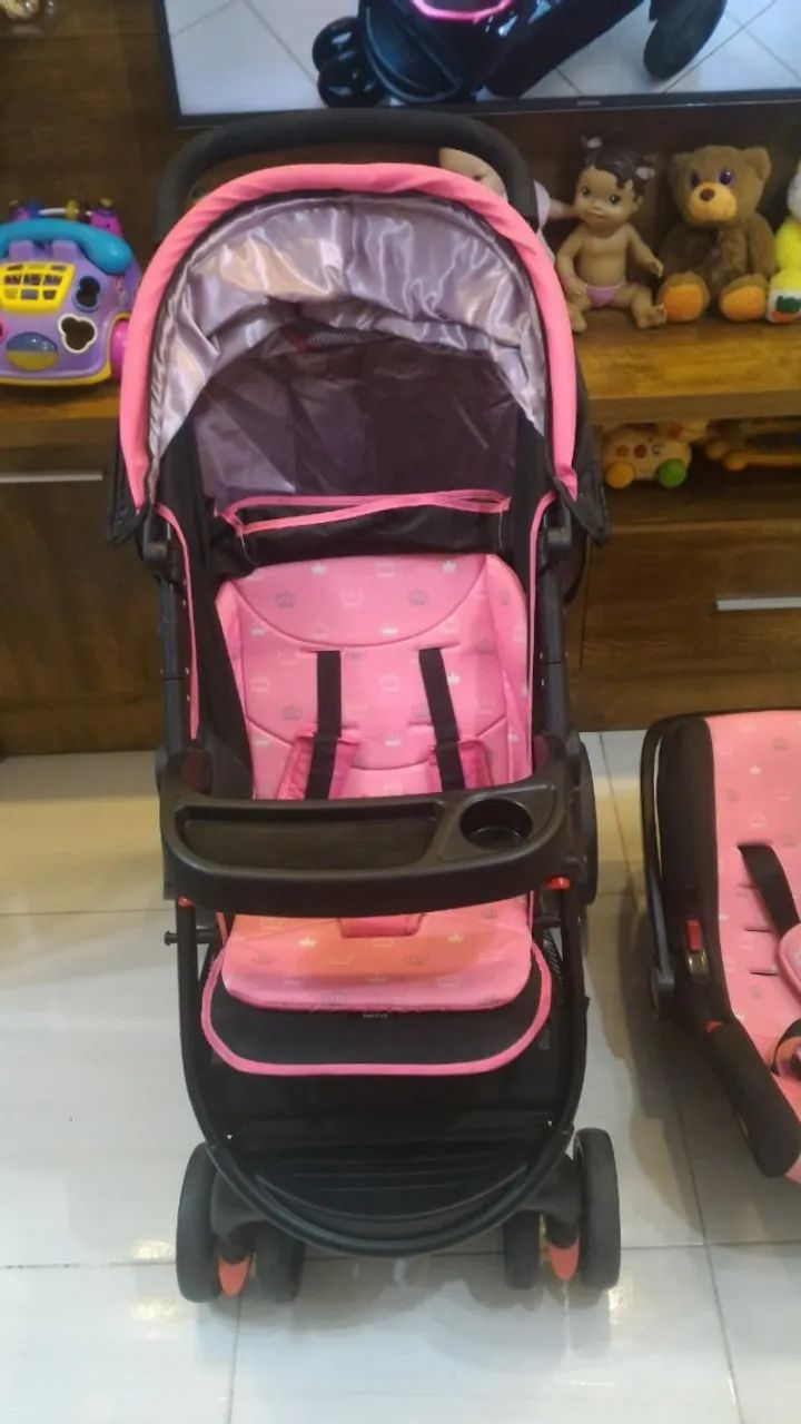 Carrinho de bebê da Cosco Rosa e Preto 