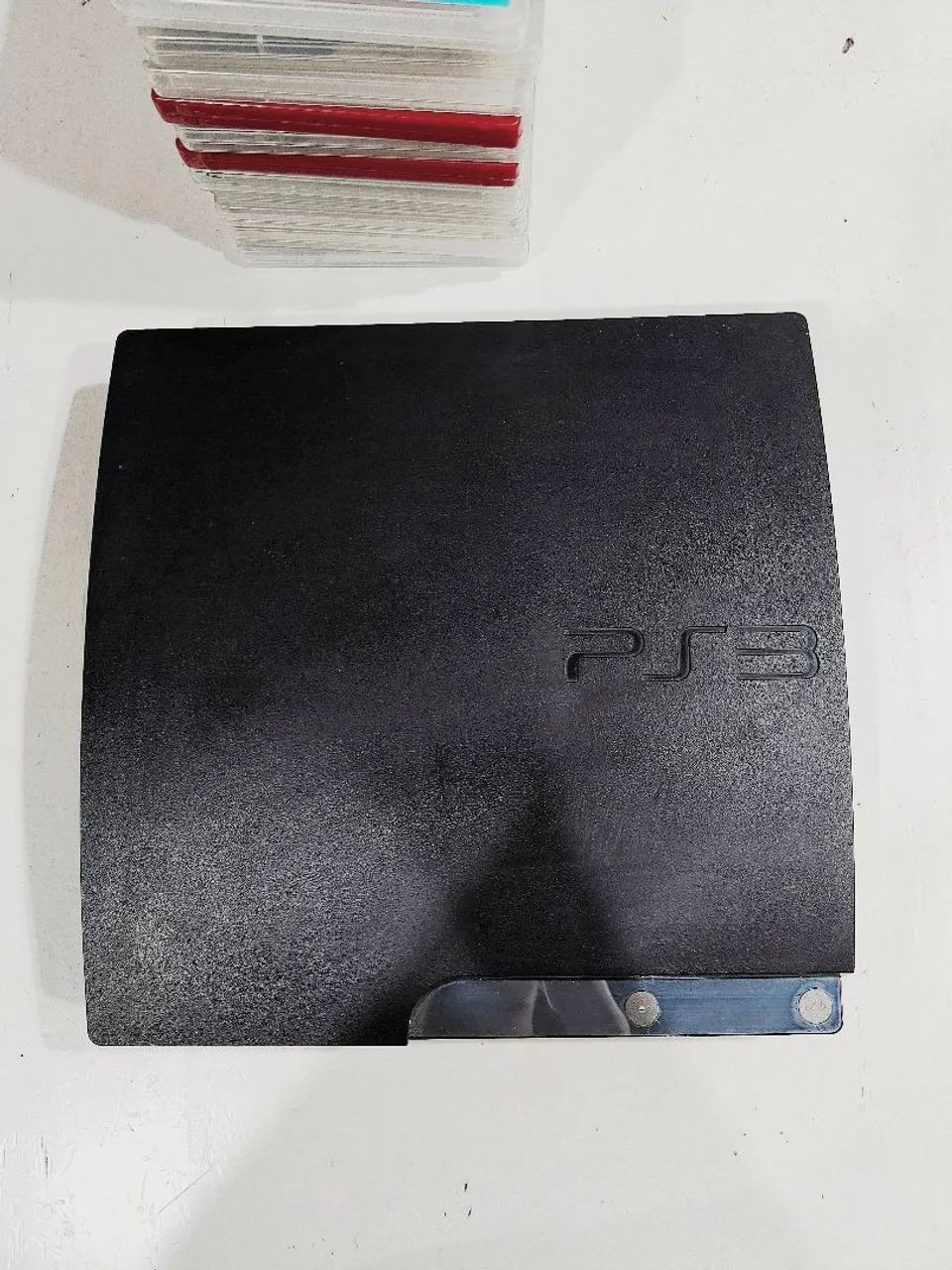 PS3 (funcionando perfeitamente)jogos e manete 