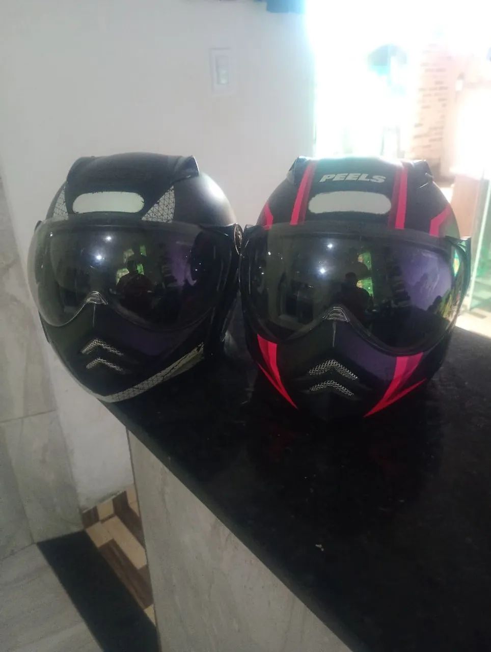 Capacetes semi novos 