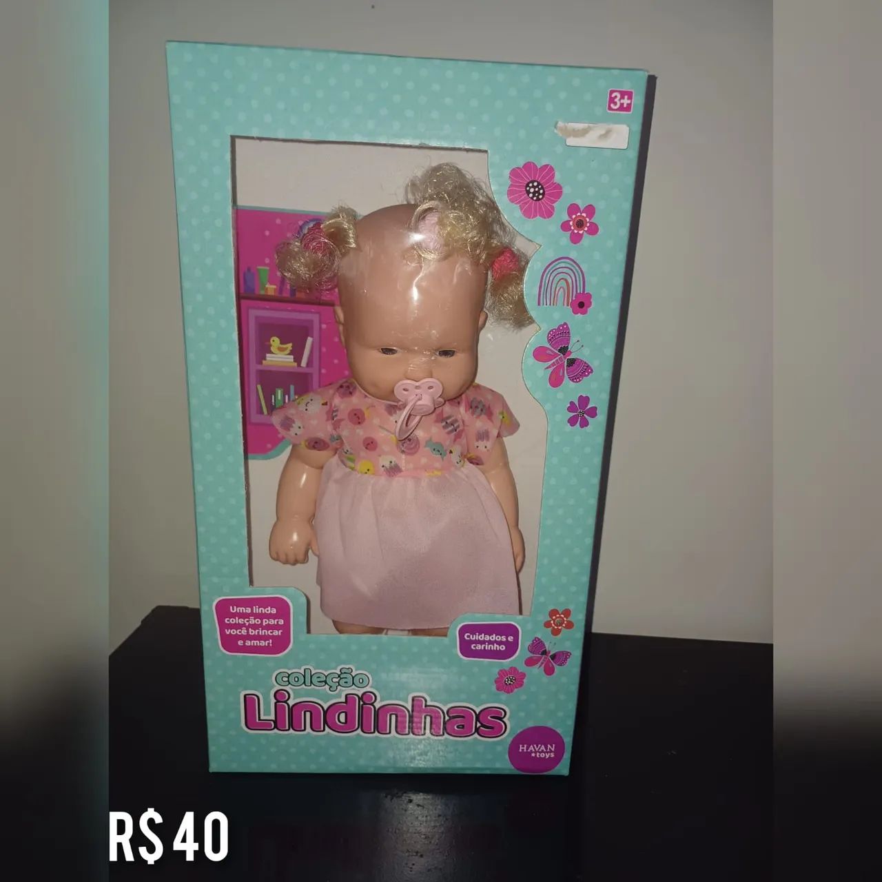 Vendo a boneca nova da caixa 