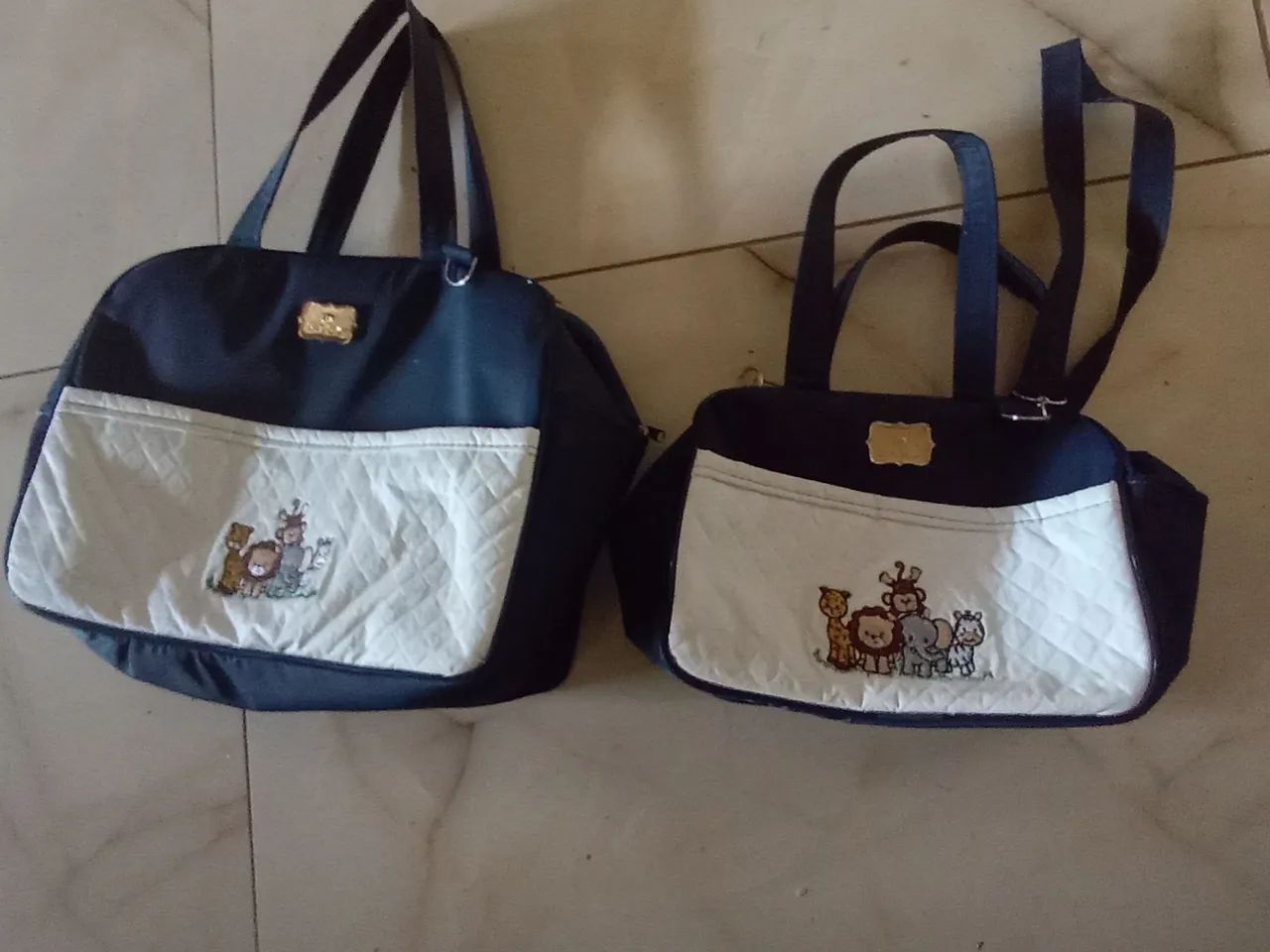 Carrinho e bebe conforto junto com as bolsas - Foto 4