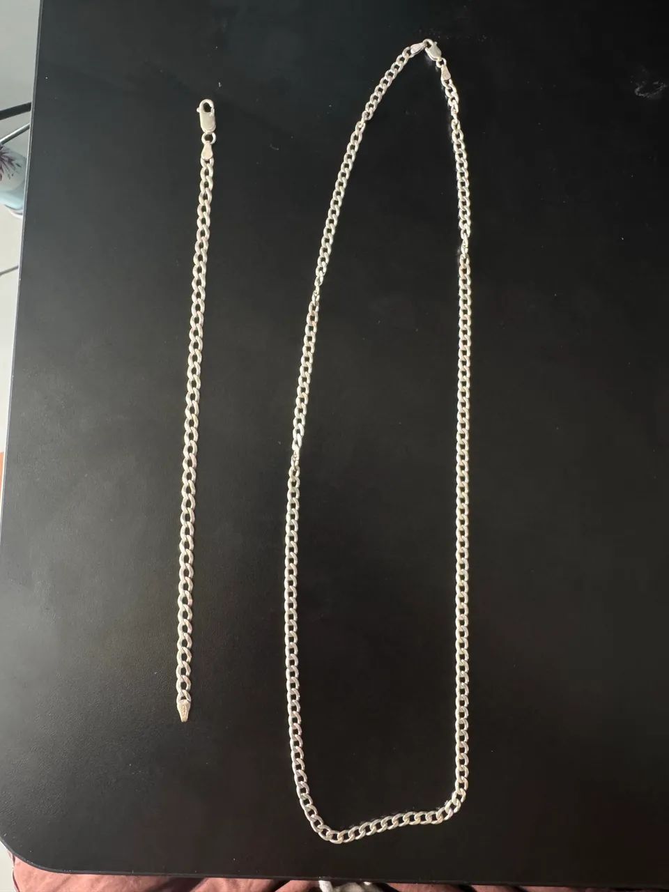 Cordão e pulseira de prata