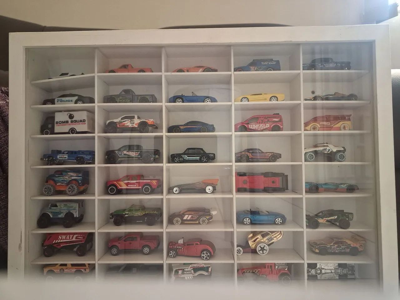 Coleção de carrinhos + expositor