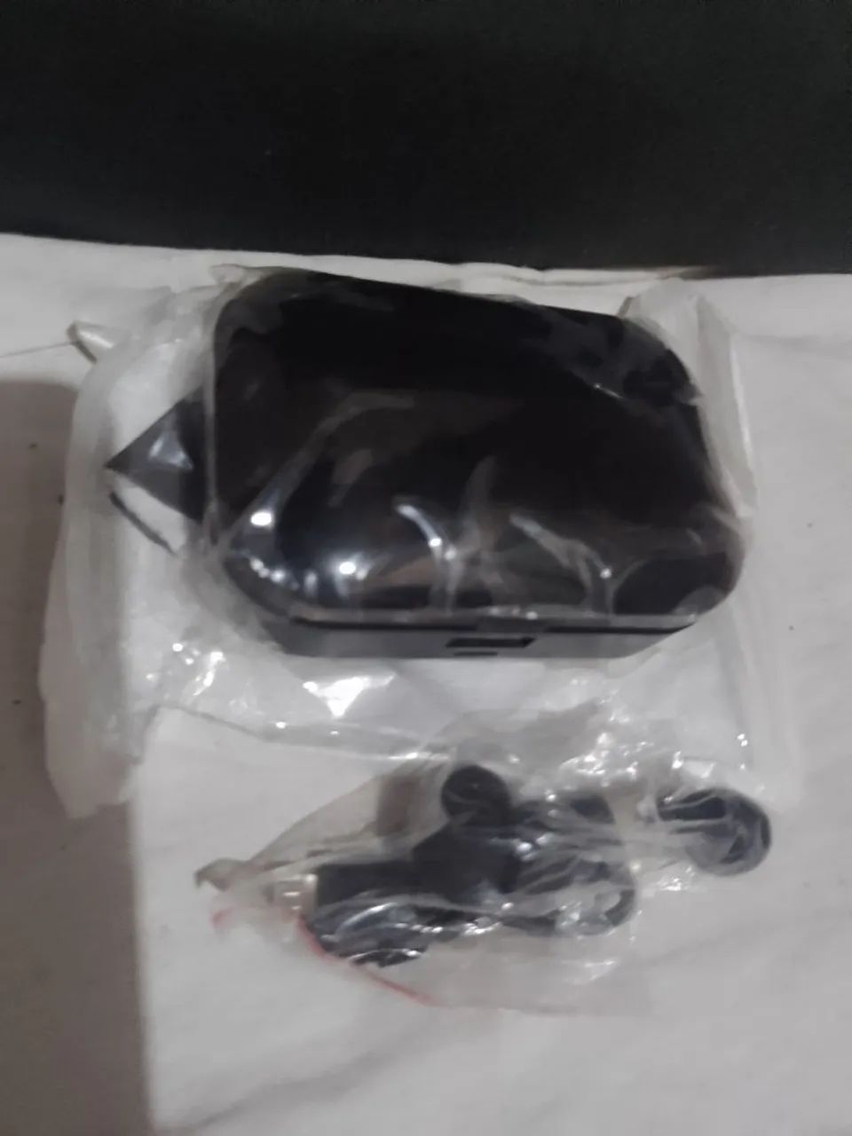 FONE TG02 carregamento Cel  - Foto 3