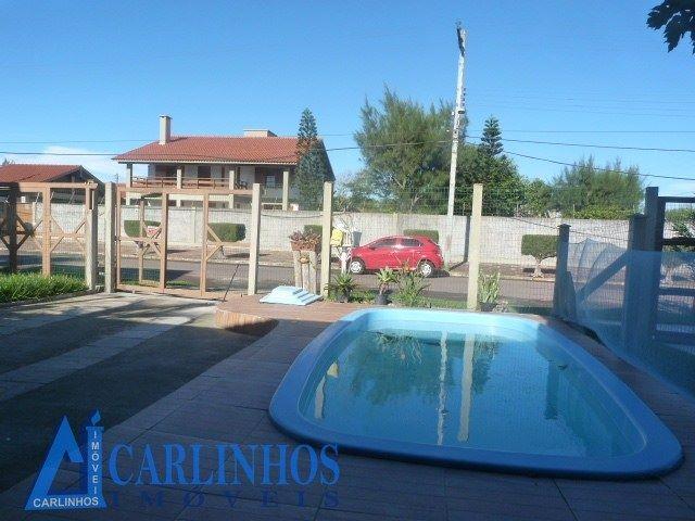 Casa em Cidreira com piscina,03 quartos,aceito carro e imóvel de menor valor na troca