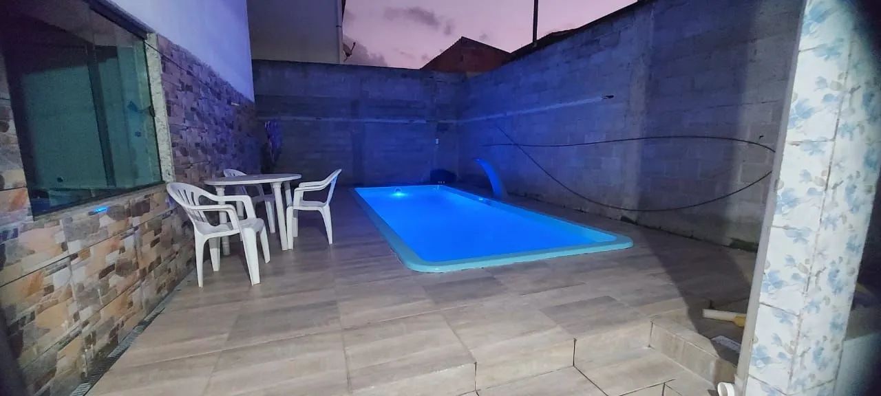 Casa com piscina em praia grande fundão 400m boteco do Chico 