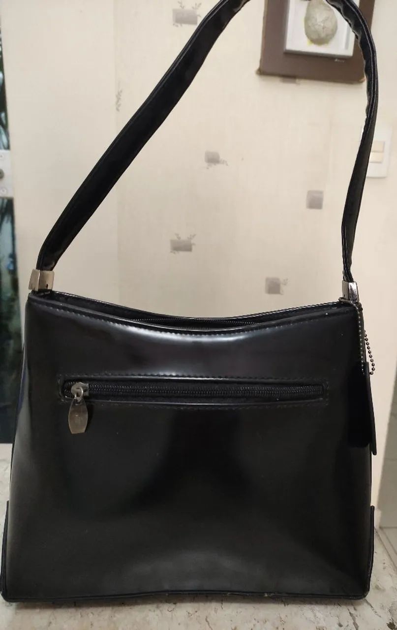 Bolsa de mão preta elegante - Foto 3