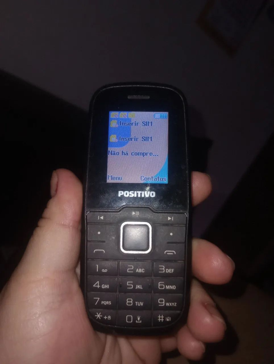Celular positivo antigo funcionando perfeitamente tudo.